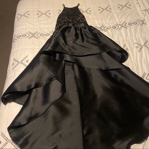 High/low dress with lace detail.